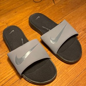 Nike Ultra Comfort slides. 14